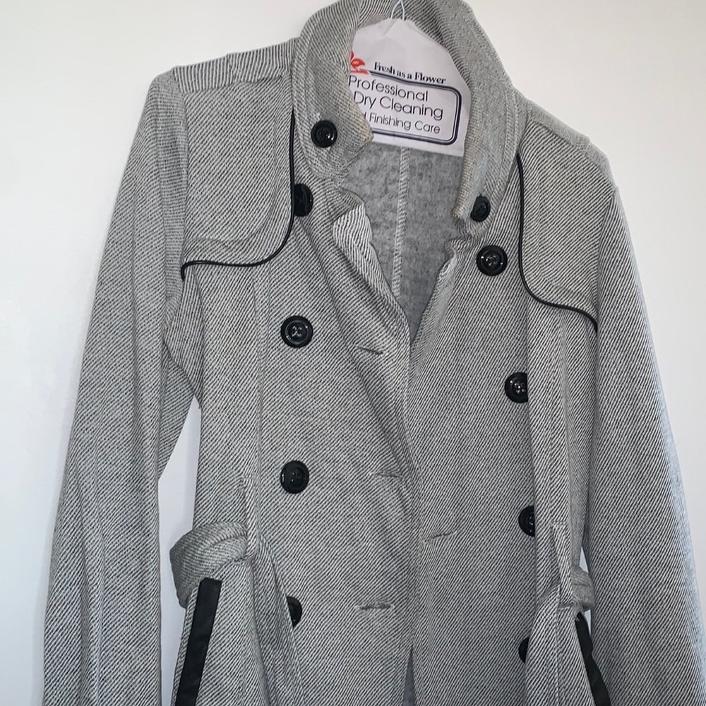 Grayish look coat.